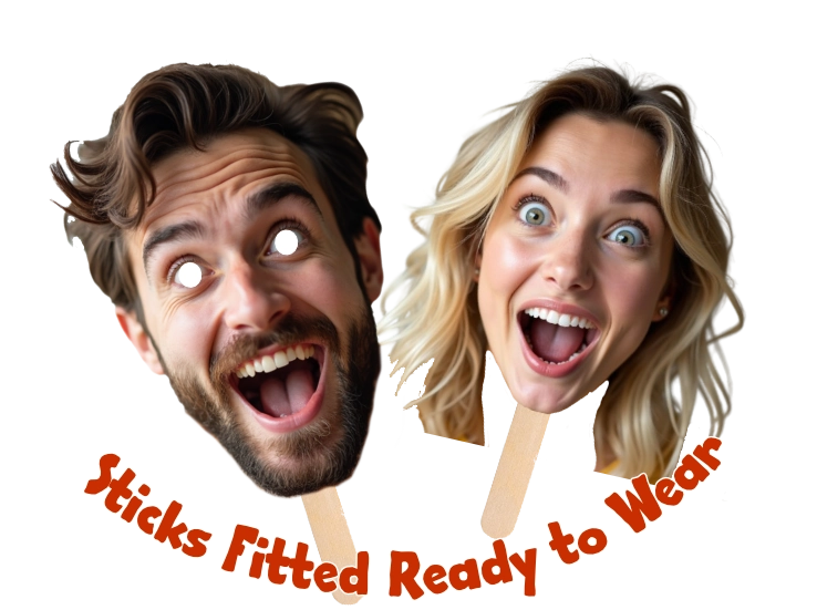 Two cardboard face masks of a man and woman on sticks with text 'Sticks Fitted Ready to Wear' on a white background.